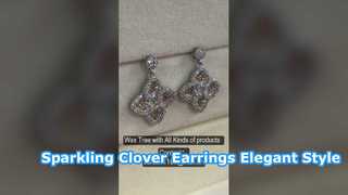 Boucles d'oreilles scintillantes en argent sterling trèfle à quatre feuilles CZ Champagne