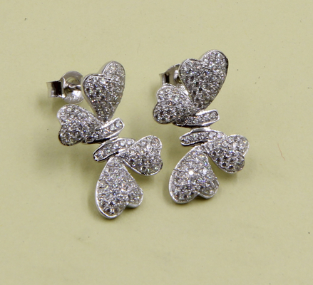 Des boucles d'oreilles en argent sterling 925 avec des pierres de zirconium cubiques, des nœuds, des boucles d'oreilles, des nœuds, un cadeau d'anniversaire pour l'amour.